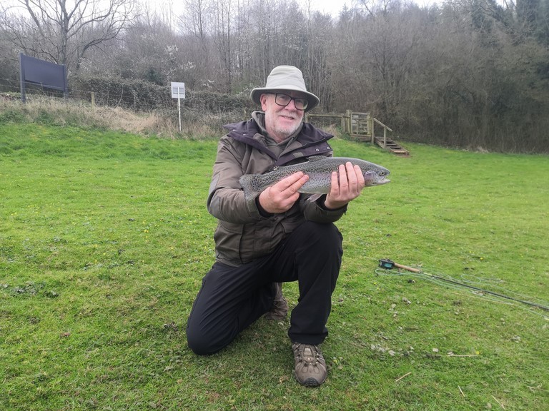 Dave with a Spartic Dave with his first fly caught rainbow trout