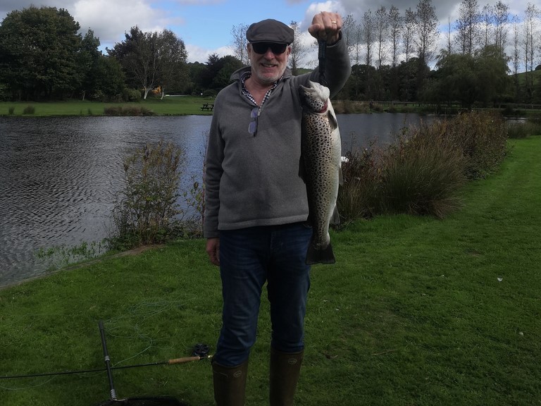 exe valley trout fishery 5 lb brown trout John with a 5.5lb exebridge Broen trout