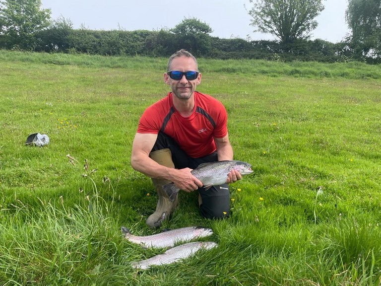 rob with his trout caught on his tuition day Rob on his fly fishing experience / gift voucher