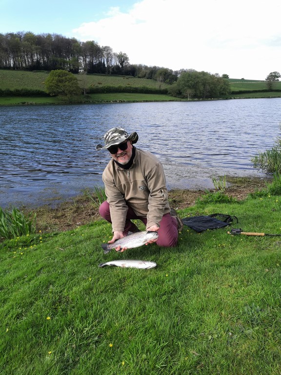 Terry with his two fly caught rainbows