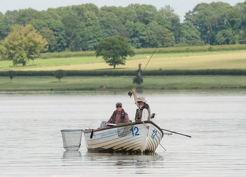 boat fishing fly fishing lesson two men in a boat fly fishing