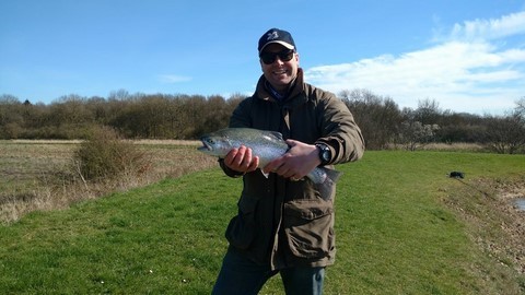 tom with his first trout